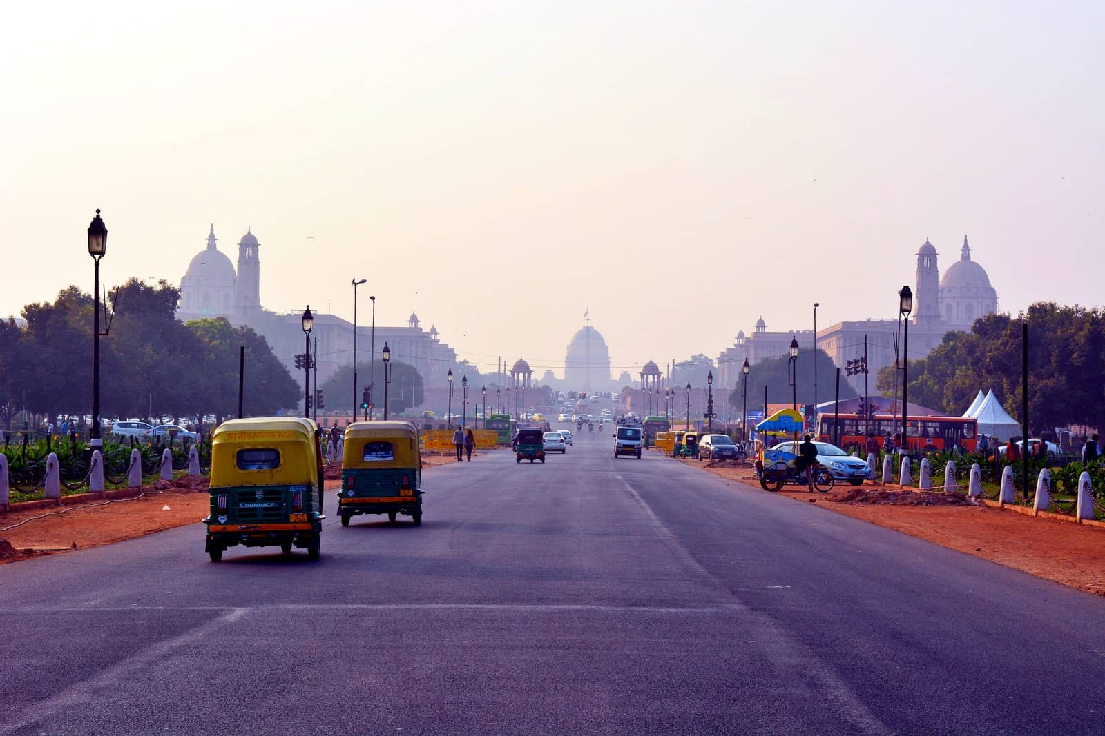 yellow bus on road during daytime