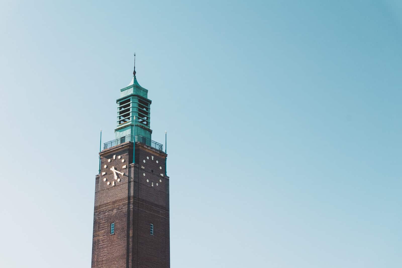 brown concrete tower under blue sky during daytime