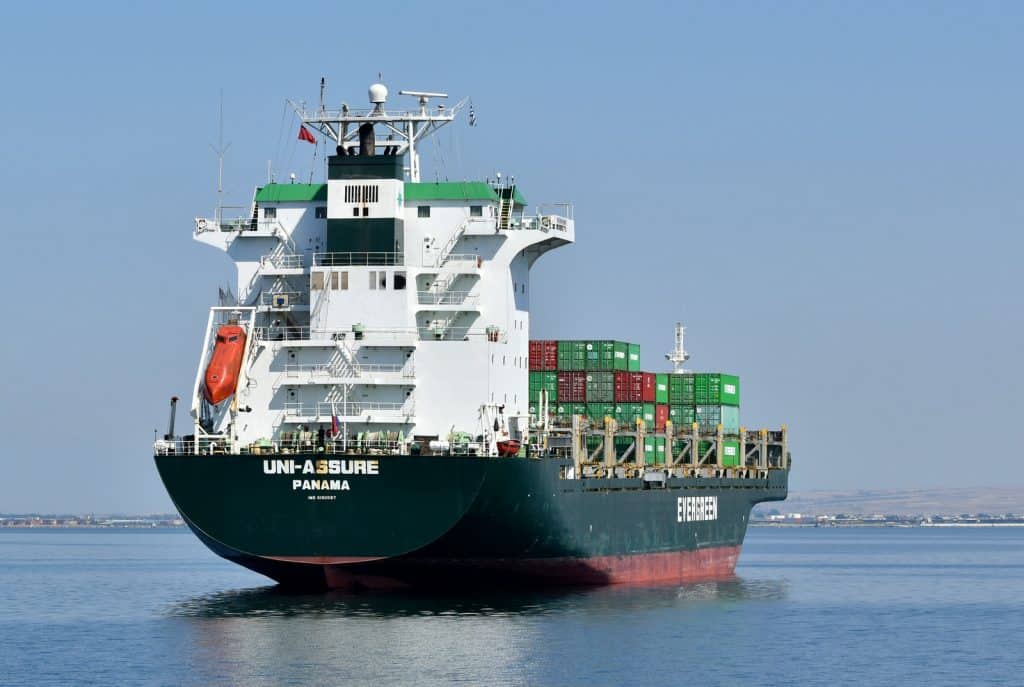 black and white cargo ship on sea during daytime