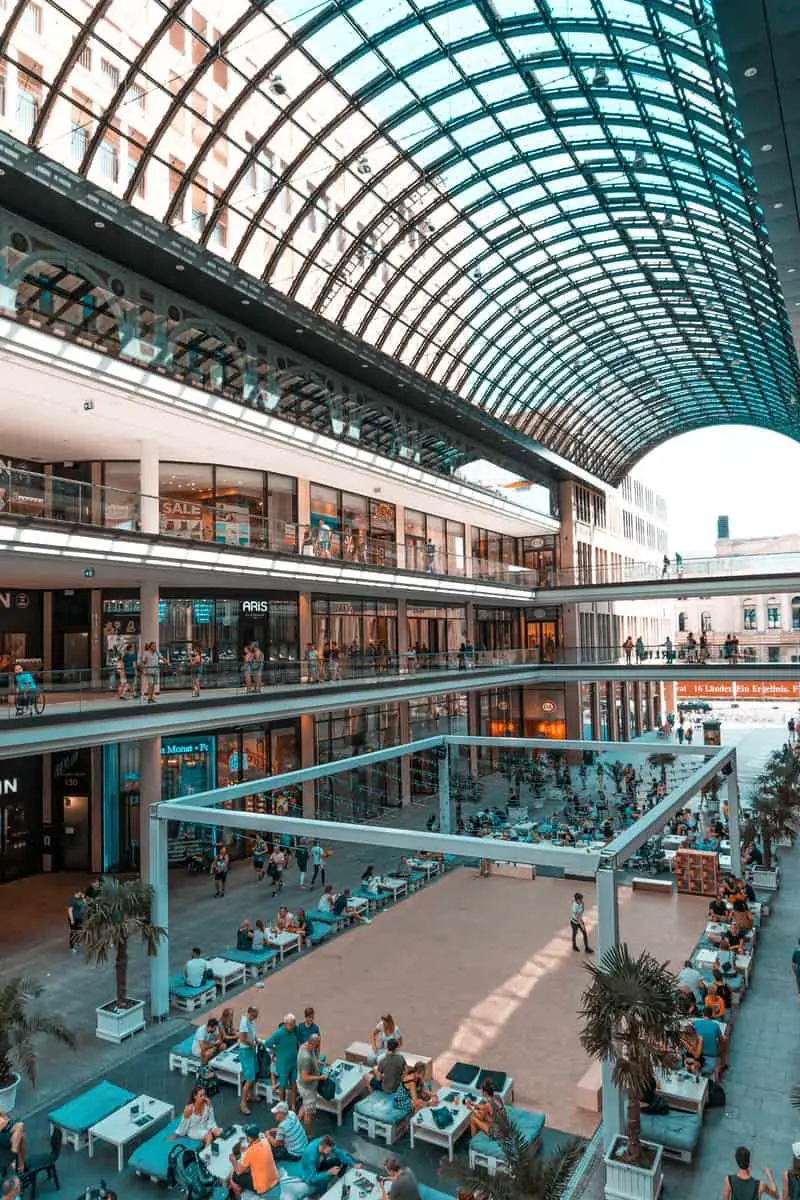 people inside grey metal building