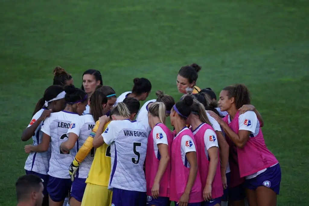 group of players on field during daytime