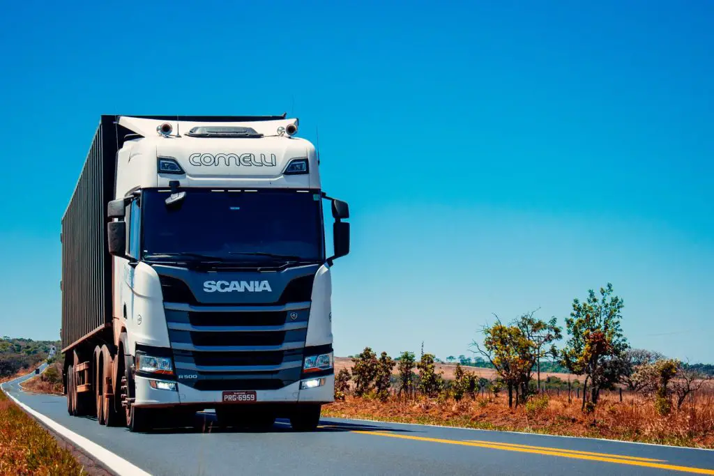 white truck on road during daytime