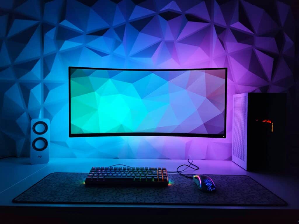 a computer monitor sitting on top of a desk