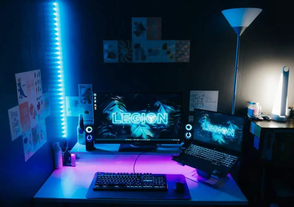 A desk with a computer and a keyboard