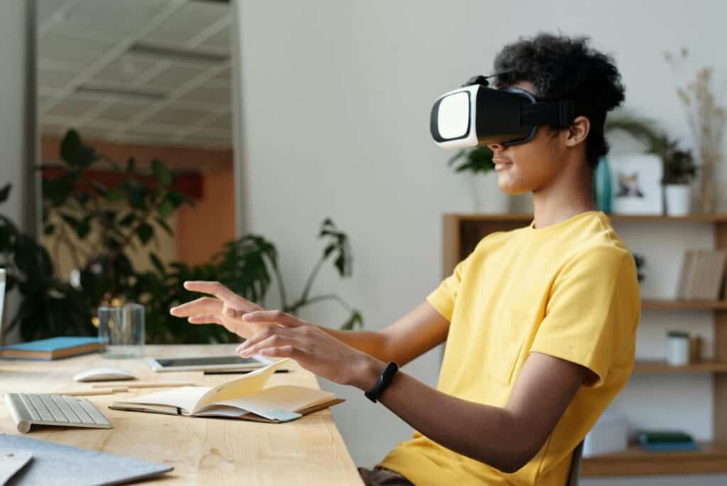 Man in Yellow Crew Neck T-shirt Using Vr Headset