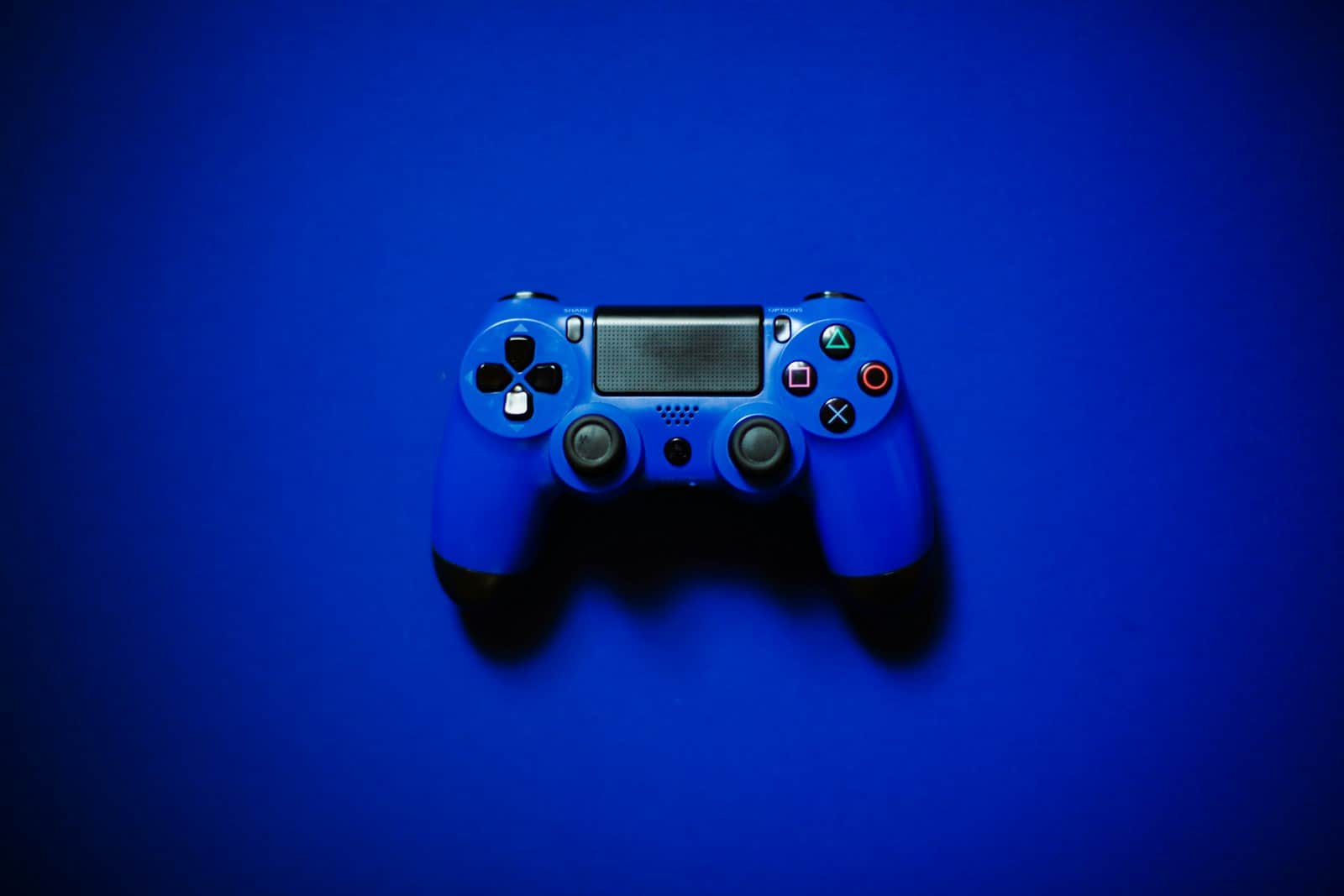 blue sony ps 4 game controller