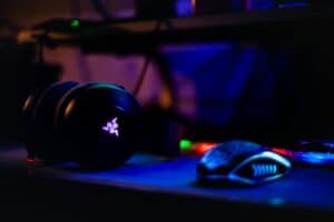 Razer headset near computer mouse