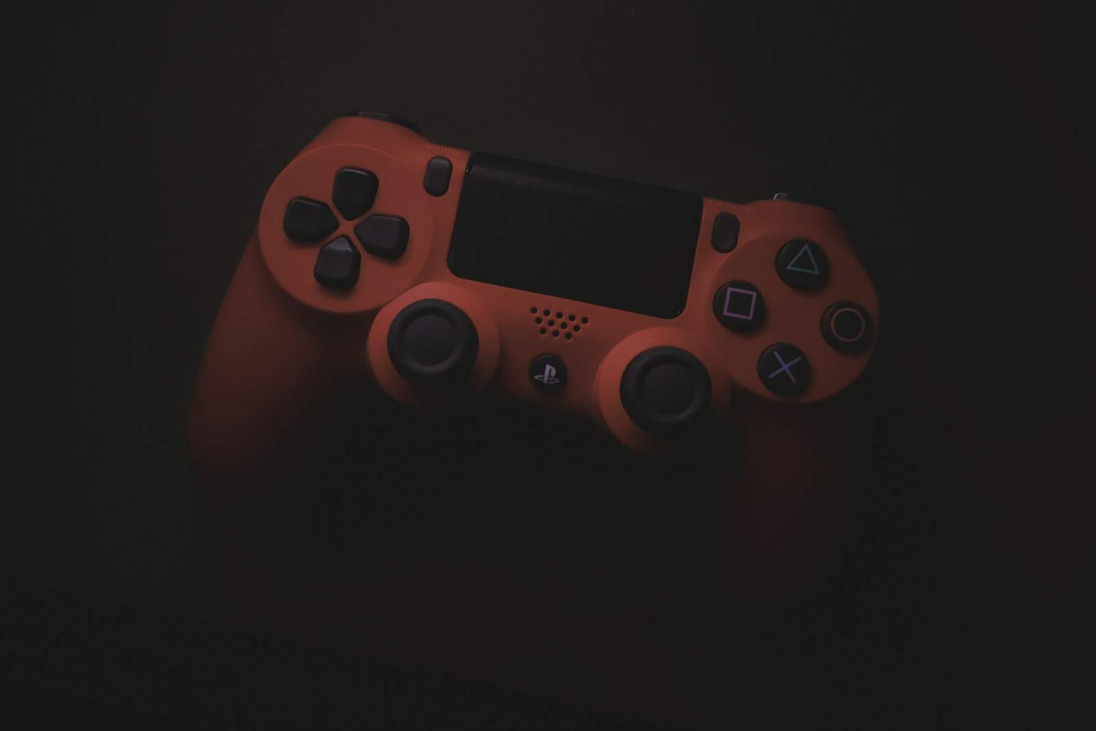 red sony ps 4 game controller