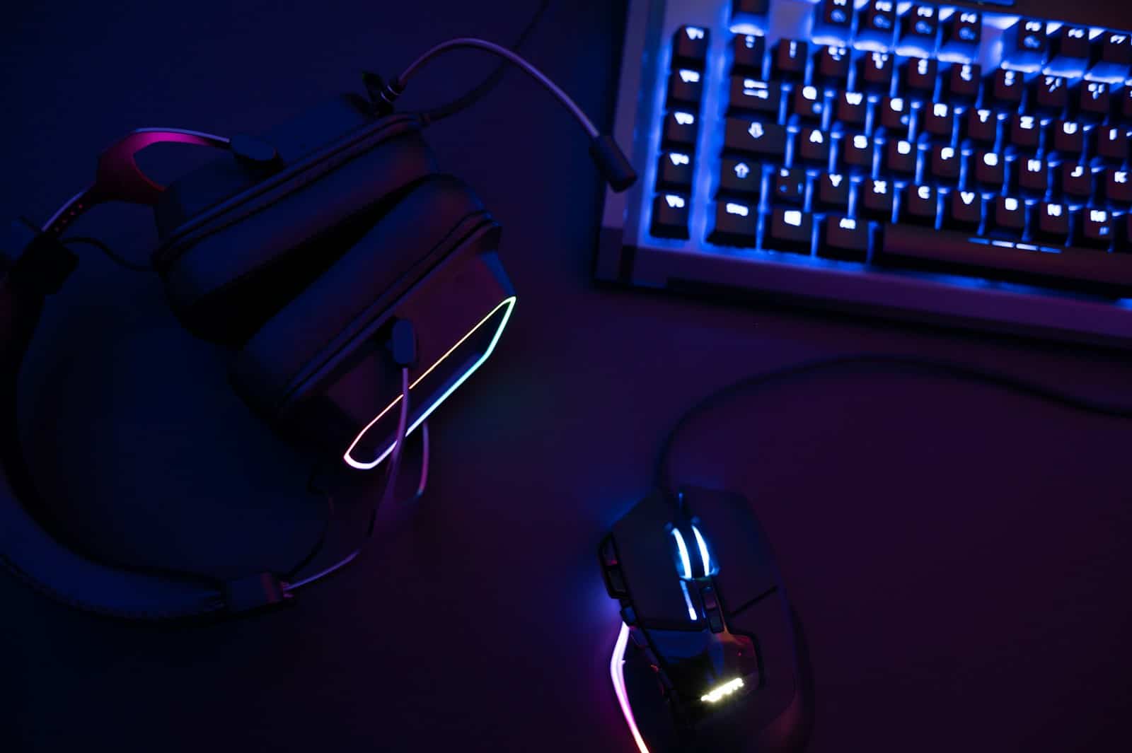 a computer mouse sitting next to a keyboard